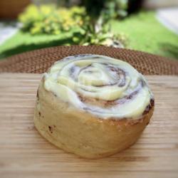 Single Cinnamon Roll With Cream Cheese Topping