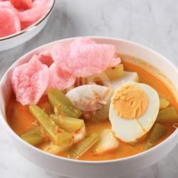 Lontong Daun Kuah Sayur