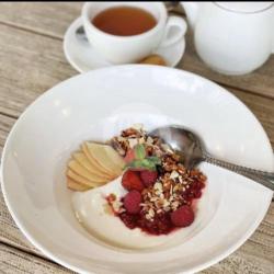 Levant Homemade Granola Served With Yoghurt And Berries