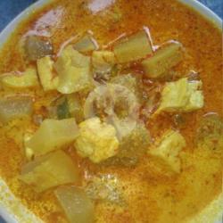 1porsi Lontong Kikil Bumbu Rendang