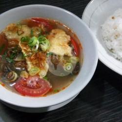 Soto Bening Campur Daging Kepala