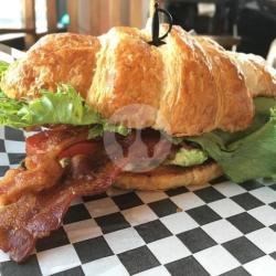 Bacon And Egg On Avocado Croissant