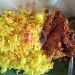 Nasi Kuning Bungkus Iwak Haruan