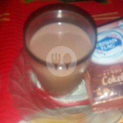 Susu Coklat Kental Manis Panas