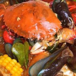 Kepiting Mix Kerang Jagung Saus Padang