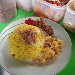 Nasi Kuning   Telur Iris   Tempe Orek   Perkedel