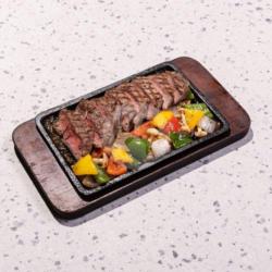 Grilled Sirloin Steak On Hot Plate