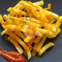 A Bowl Of Cheezy French Fries