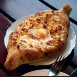 Khachapuri ( Georgian Cheese And Egg Flat Bread)